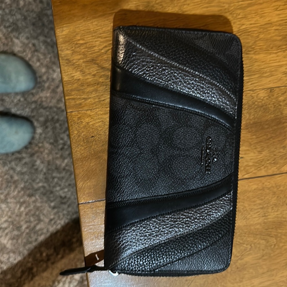 Coach medium sized zip around wallet.
